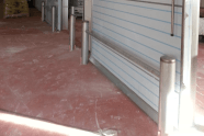 Protección puertas Inox bolardos